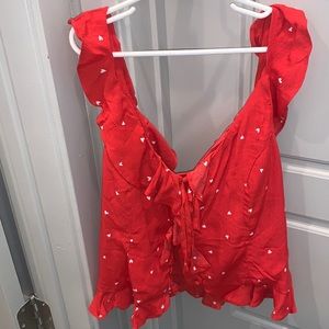 Red ruffle top with heart details